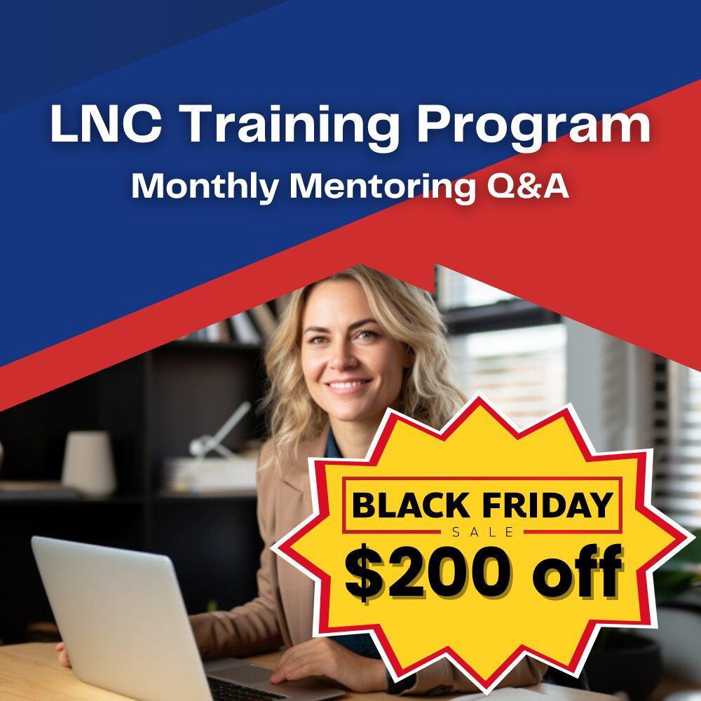 A woman sitting at a table with a laptop.